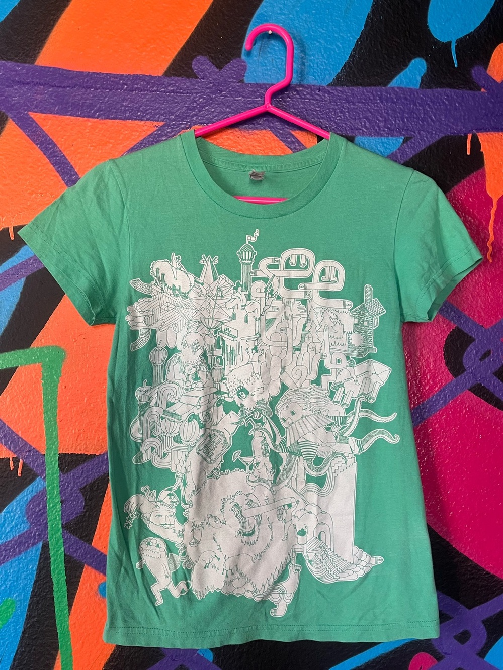 Mike Perry Illustrated Screenprint Artwork on American Apparel teal baby tee